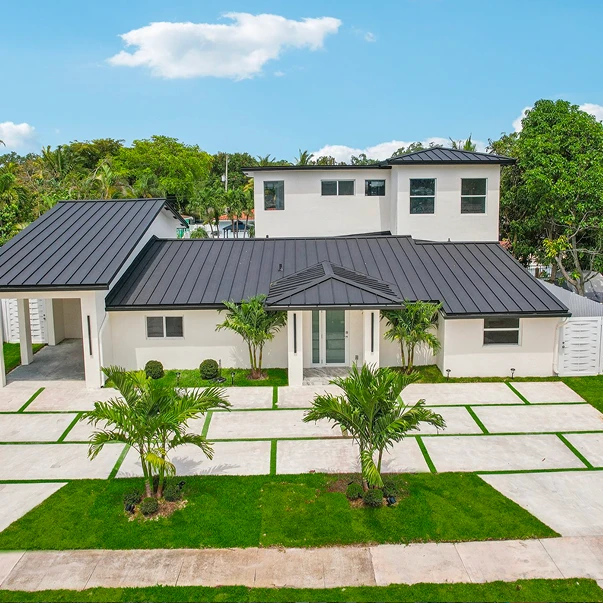 Driveways and entry hardscape that improve arrival and curb presence